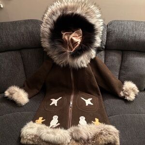 Vintage Inuit Women's handmade wool parka with fur sunburst hood